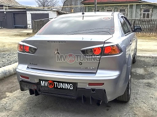 Накладка на задний бампер в стиле EVO Текстурный пластик var №2 Mitsubishi Lancer X (2007-2016)